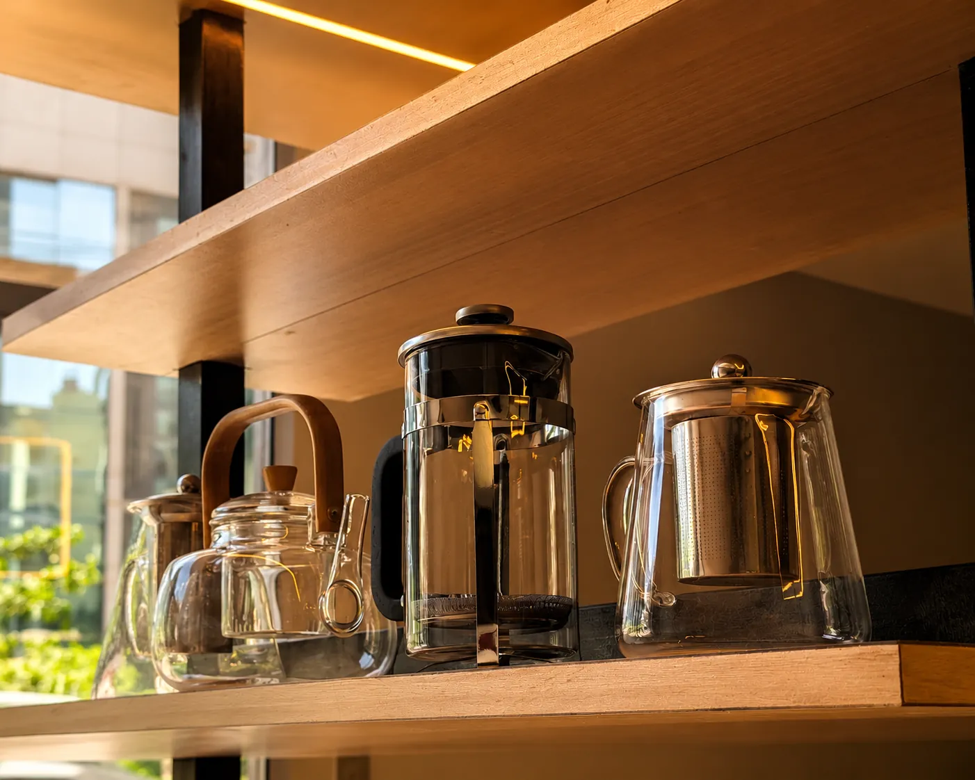 Glass brewing tools on a shelf