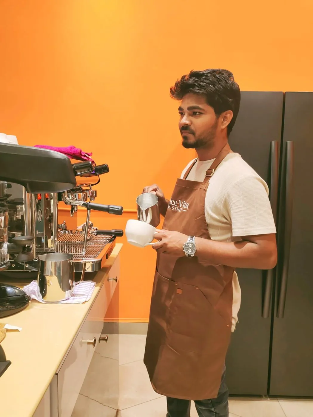 Behind the bar as a barista